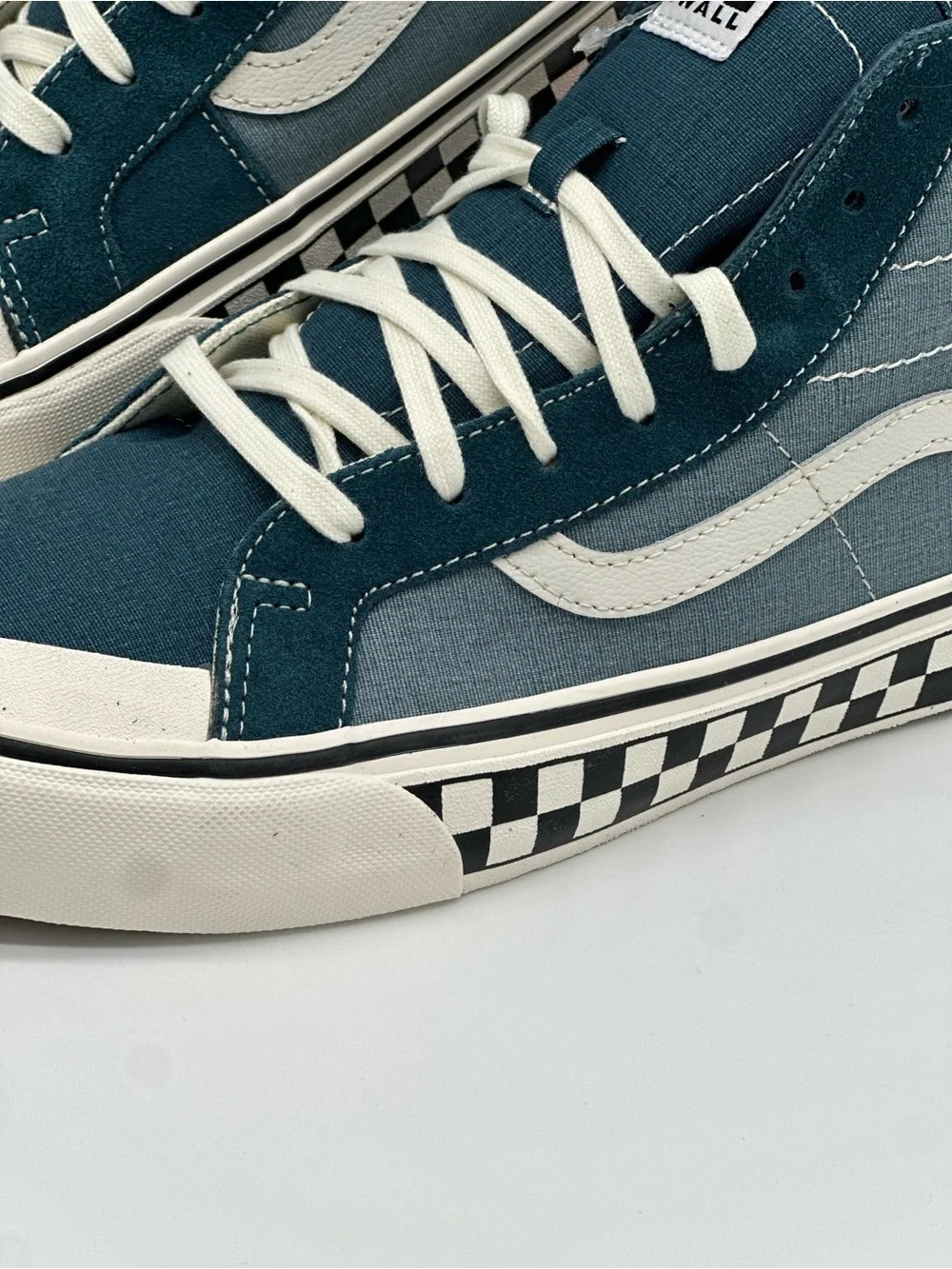 Vans Mid-Top Sneakers in Teal and White with Checkerboard Sole